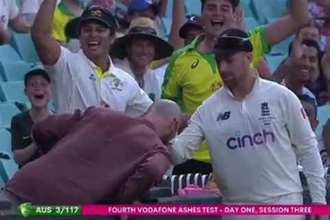 Watch Ashes star Jack Leach sign fan’s HEAD as England battle Australia on rain-affected day in..