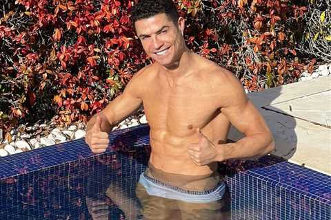 Cristiano Ronaldo poses in tiny swim shorts as he relaxes in pool at home after missing Man Utd..