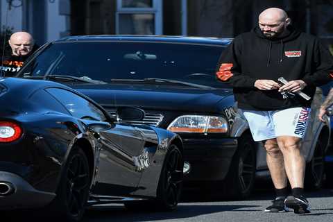 Tyson Fury squeezes into £250,000 Ferrari with 6ft 9inch frame struggling to get into supercar..