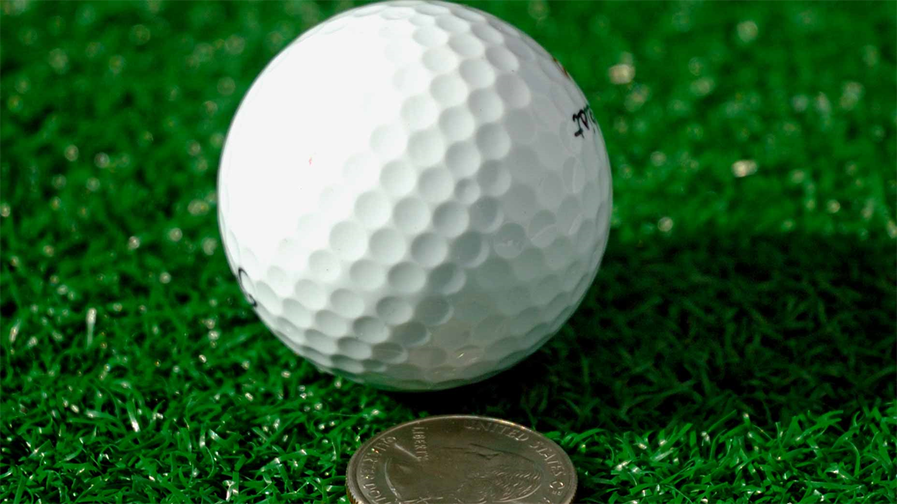 How to use pocket change to improve your putting stroke