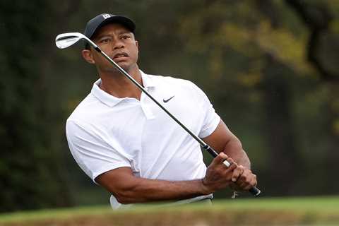 Tiger Woods spotted walking with a limp on eve of Masters as five-time champ prepares for comeback..