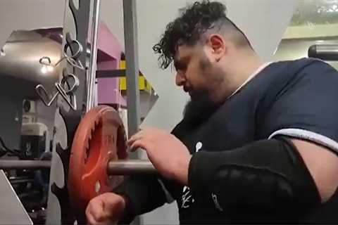 Watch Iranian Hulk in bizarre training routine for Kazakh Titan fight that includes punching a..