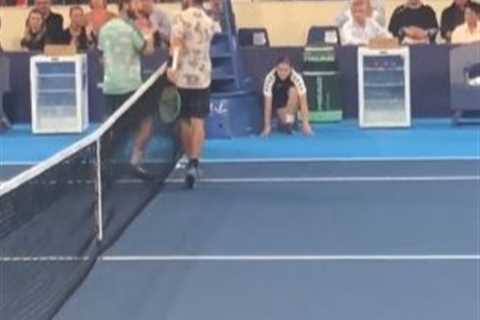 Watch tensions boil over at tennis event as players have to be pulled apart by umpire after fiery..