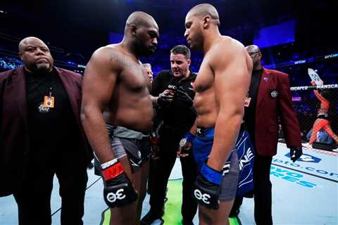 Jon Jones quickly taps out Ciryl Gane to become heavyweight champion in his first fight in three..