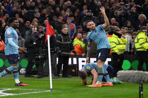 Burnley star Johann Gudmundsson hit on head with object thrown from crowd as he celebrates goal..