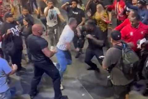 Watch insane mass brawl break out in crowd at Mayweather vs Gotti III as men wildly swing at each..