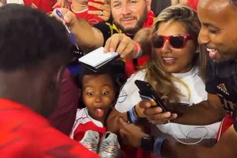 Heartwarming moment young Arsenal fan is left in shock after Bukayo Saka gives him his boots