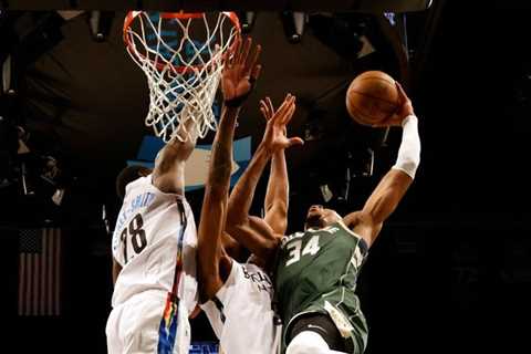 'He has entered the building!' - Giannis dunks all over the Nets!