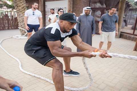 Anthony Joshua loses in bizarre tug-of-war against a LIGER as Brit boxing hero enjoys trip to zoo..