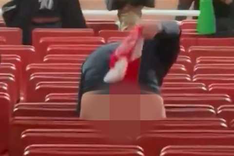 Half-naked Newcastle Fan Causes Stir by Performing Lewd Act with Arsenal Scarf