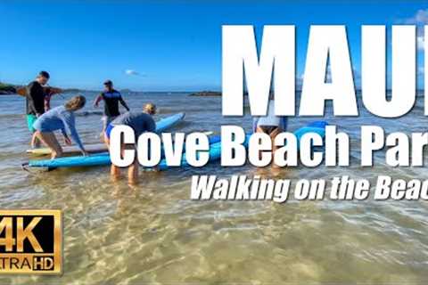 Close up view of surfing lessons at the street and surf at Cove Beach Park in Kihei, Maui, Hawaii 4K