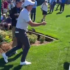 Moment angry Rory McIlroy snatches phone off fan and storms off after heckle ahead of Players..