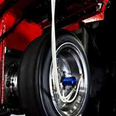 Understanding the Essential Role of Tire Changers in Auto Racing Events